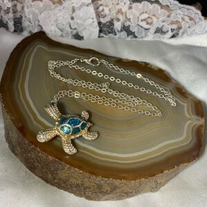 Charming Silver Sea Turtle Necklace with Blue Highlights